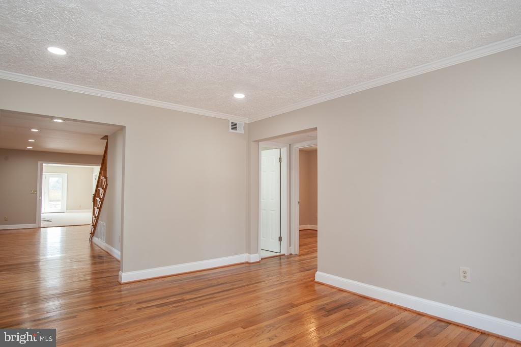 6525 Joyce Road Alexandria, VA 22310 - Photo 6 of 51 a view of empty room with wooden floor