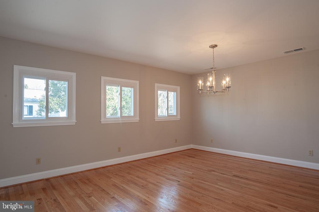 6525 Joyce Road Alexandria, VA 22310 - Photo 10 of 51 a view of empty room with wooden floor and window