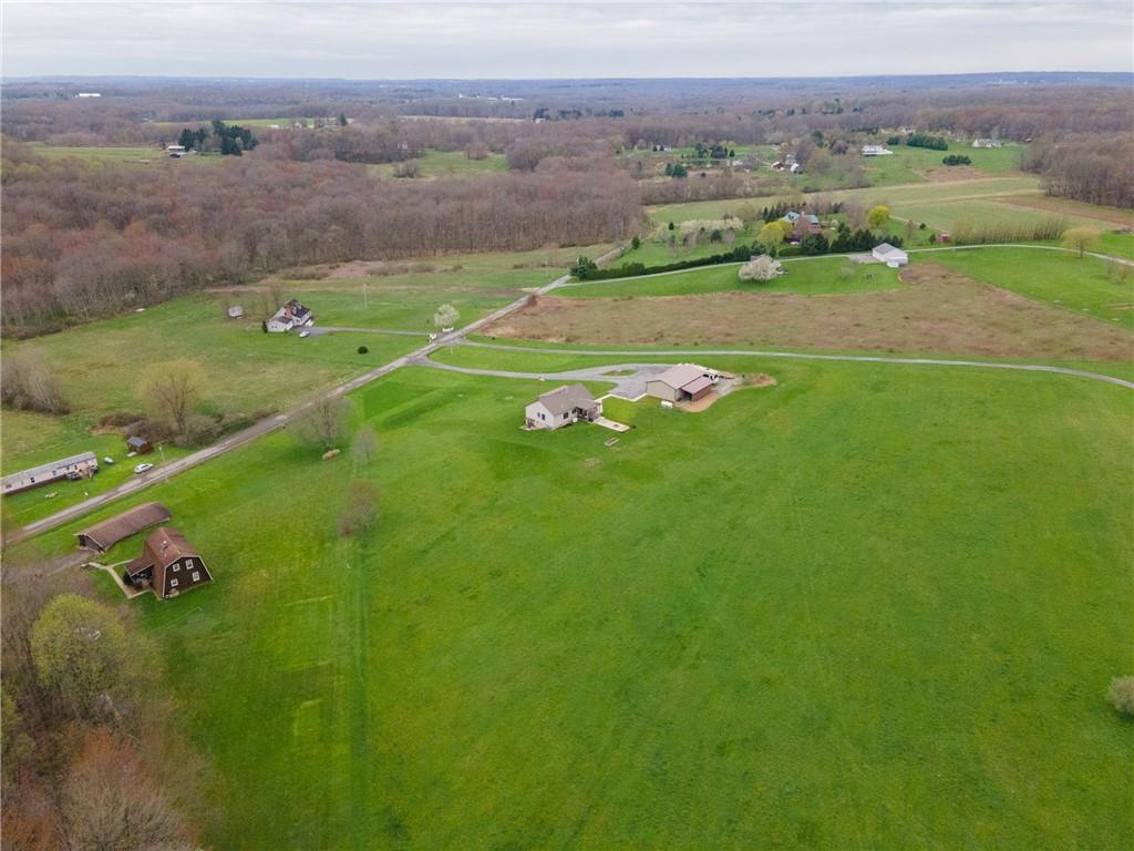 145 Duncan Road Harrisville, PA 16038 - Photo 35 of 46 an aerial view of a golf course with a big yard