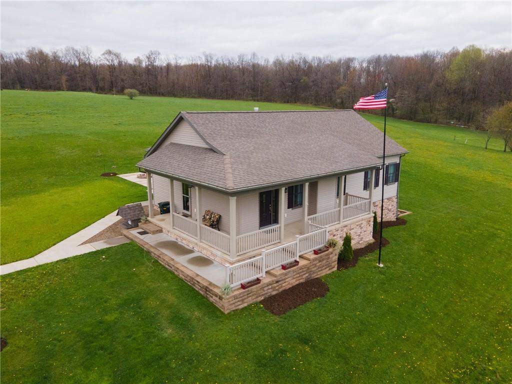 145 Duncan Road Harrisville, PA 16038 - Photo 8 of 46 an aerial view of a house with swimming pool and garden