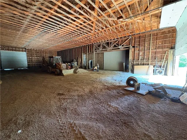 a view of a chairs and table in the patio