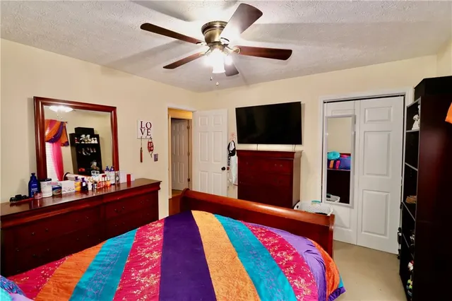 a view of a hallway with a livingroom and a dinning area