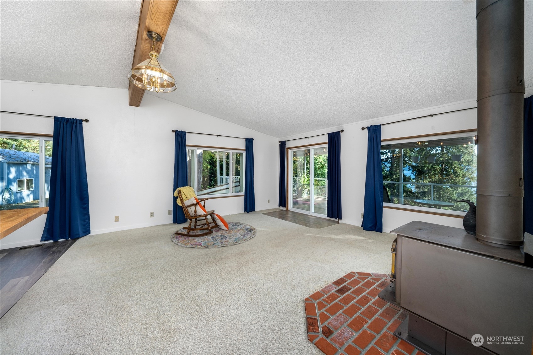 9320 Northeast North Shore Road Belfair, WA 98528 - Photo 27 of 40 a room with furniture and a large window