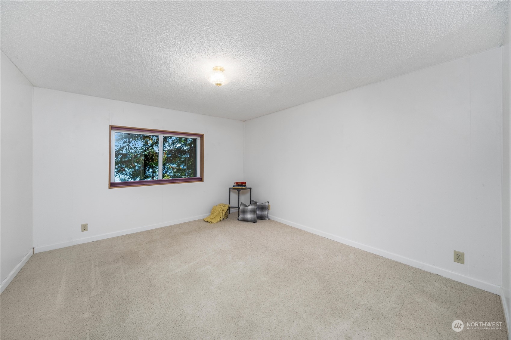 9320 Northeast North Shore Road Belfair, WA 98528 - Photo 29 of 40 an empty room with windows