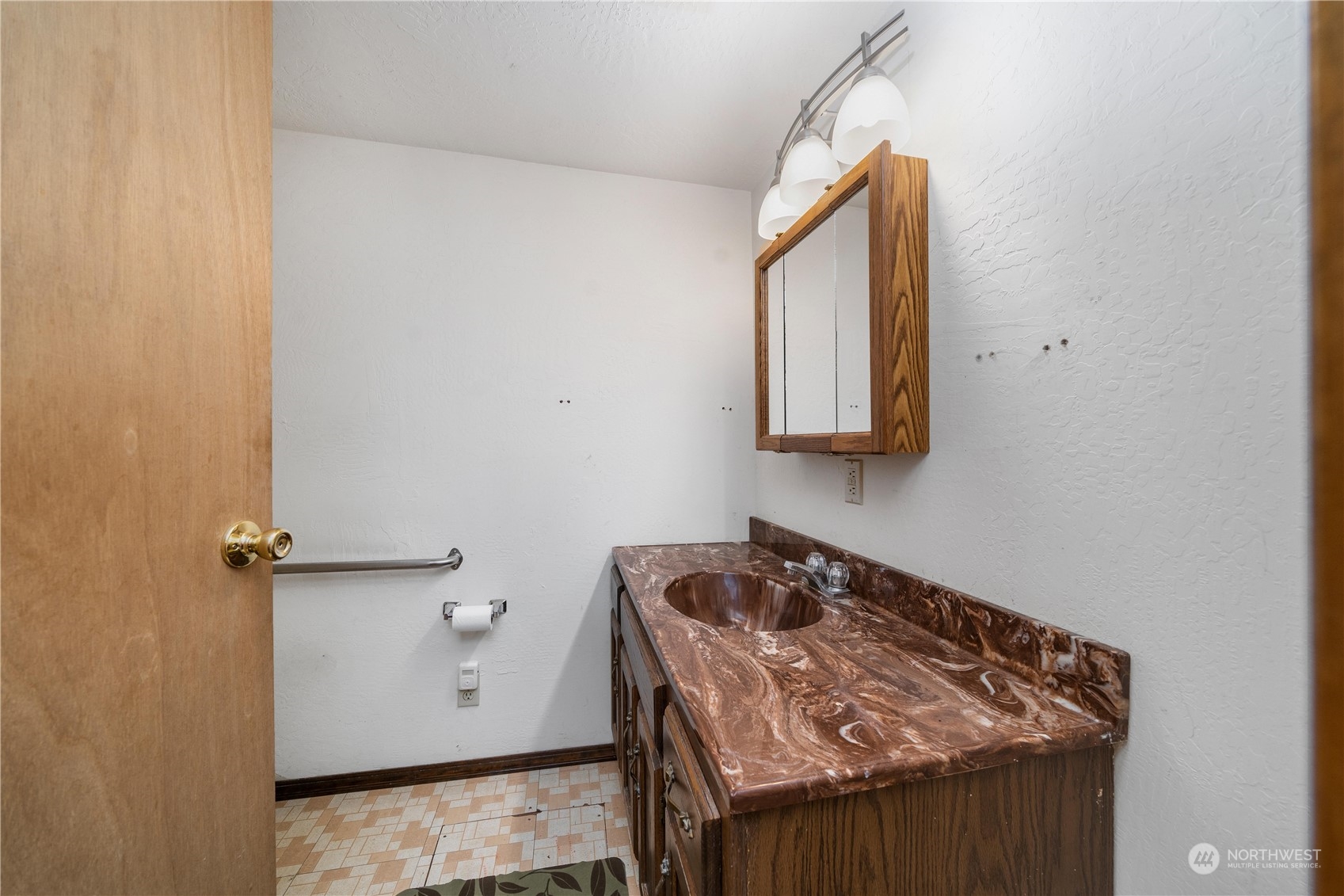 9320 Northeast North Shore Road Belfair, WA 98528 - Photo 38 of 40 a bathroom with a granite countertop sink and a mirror