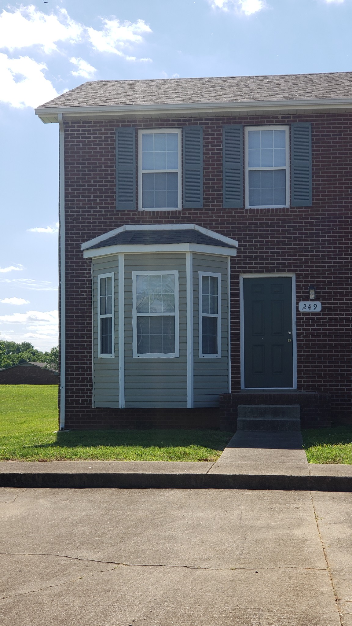 249 Tree Line Drive Oak Grove, KY 42262 - Photo 2 of 2 a front view of a house with a yard
