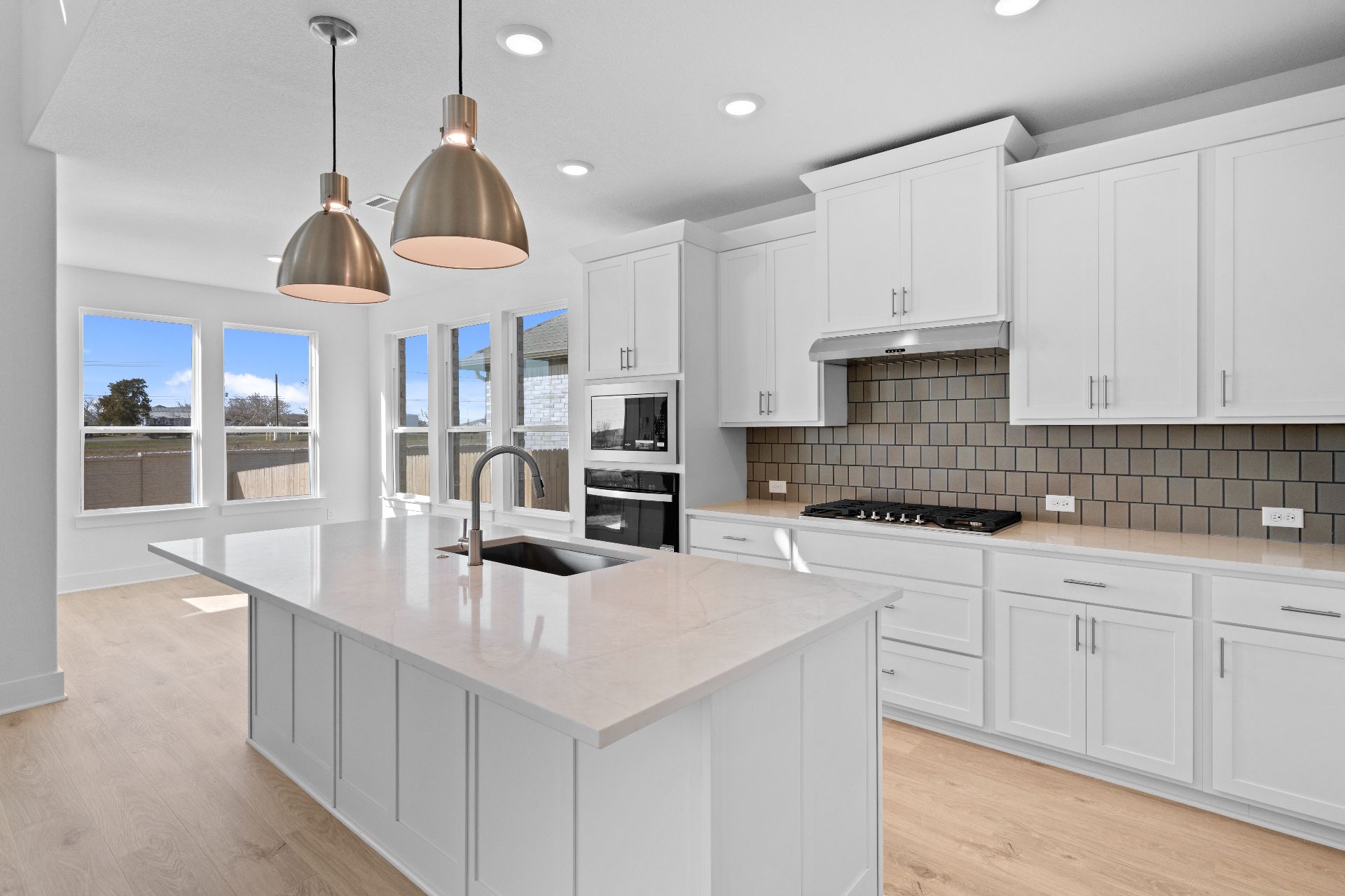 17413 Graces Path Pflugerville, TX 78660 - Photo 8 of 33 Stunning finishes in Light & Bright Kitchen