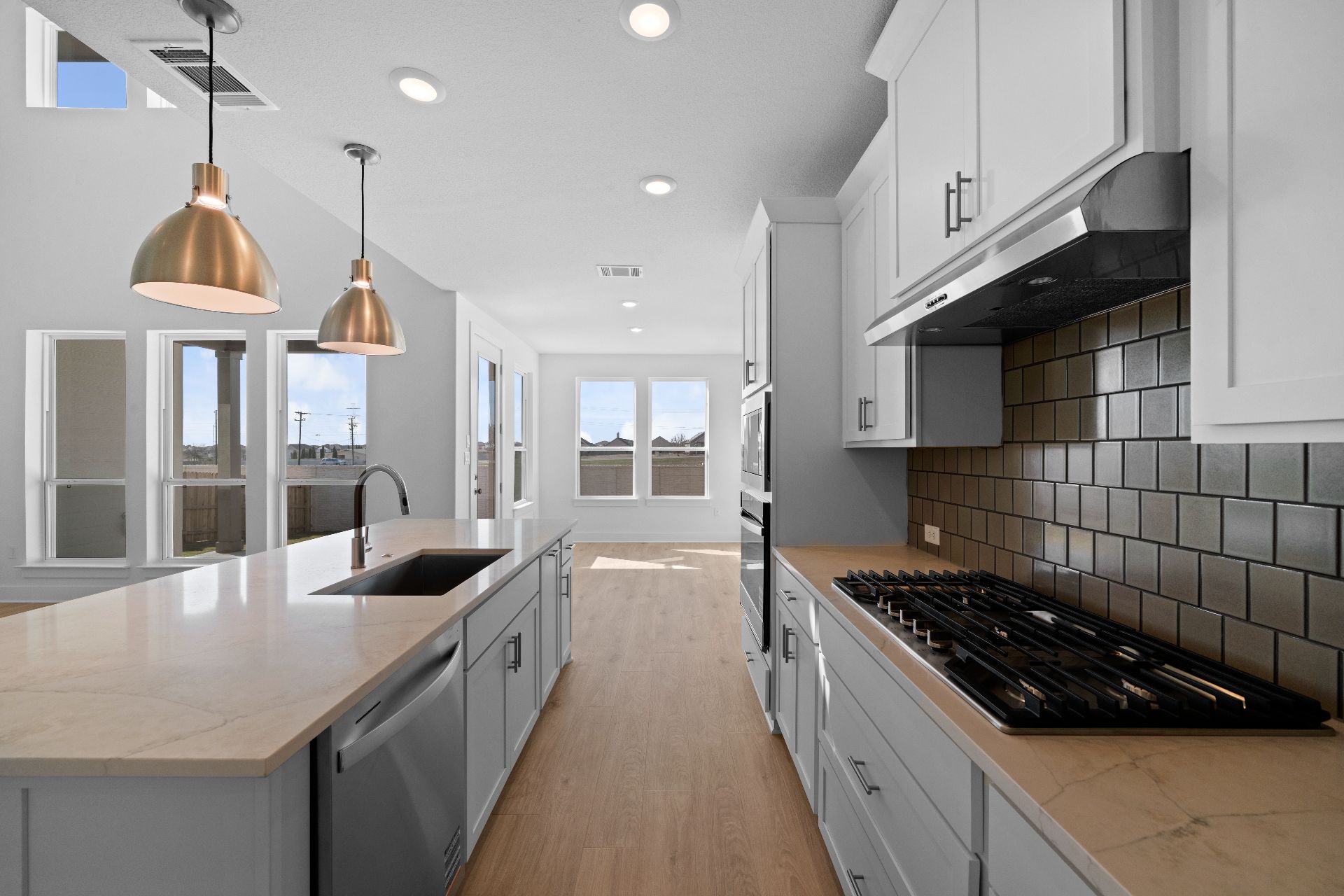 17413 Graces Path Pflugerville, TX 78660 - Photo 9 of 33 Stunning finishes in Light & Bright Kitchen