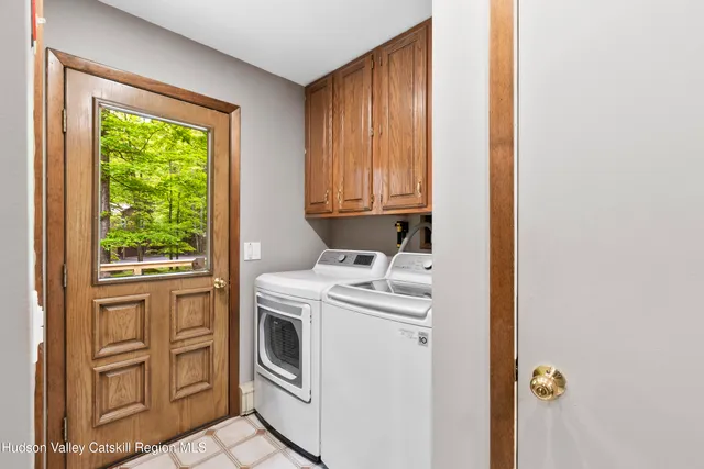 a storage room with washer and dryer
