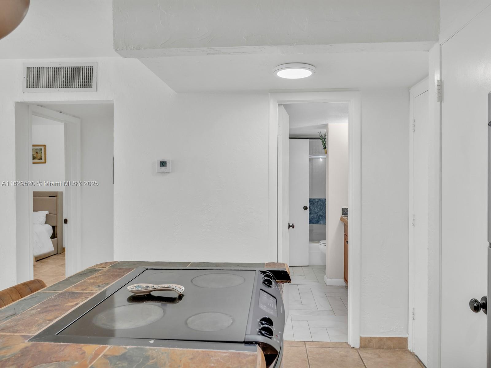 7403 Southwest 82nd Street, Unit 201N Miami, FL 33143 - Photo 15 of 43 a view of a room with gym equipment