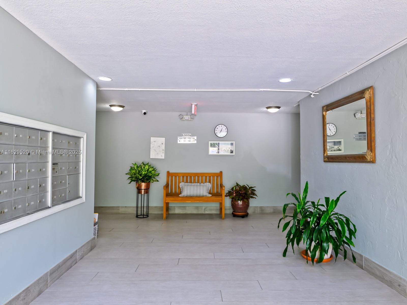 7403 Southwest 82nd Street, Unit 201N Miami, FL 33143 - Photo 10 of 43 a living room with furniture