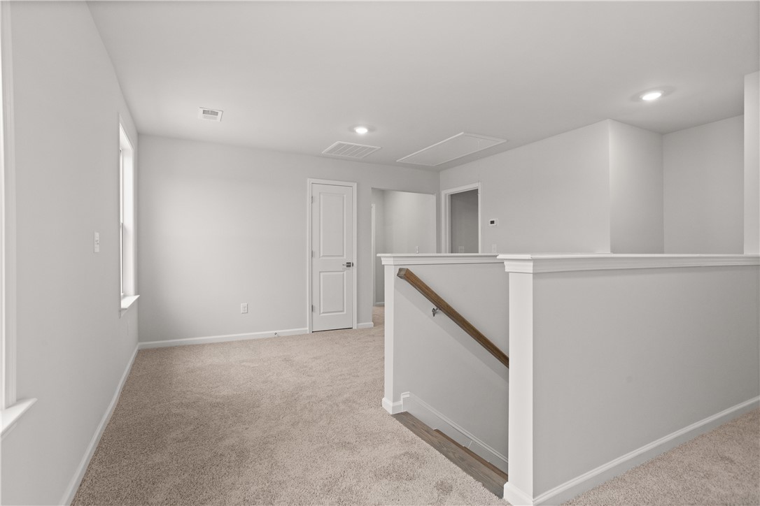 629 Sweetspire Trail, Unit 149 Seneca, SC 29678 - Photo 11 of 30 A versatile open landing area awaits, offering potential for an additional living space or a home office.