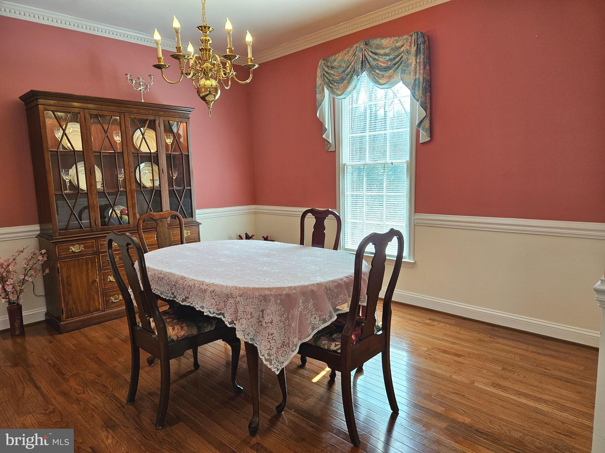 1711 Ritchie Highway Annapolis, MD 21409 - Photo 7 of 16 a view of a dining room with furniture wooden floor and chandelier