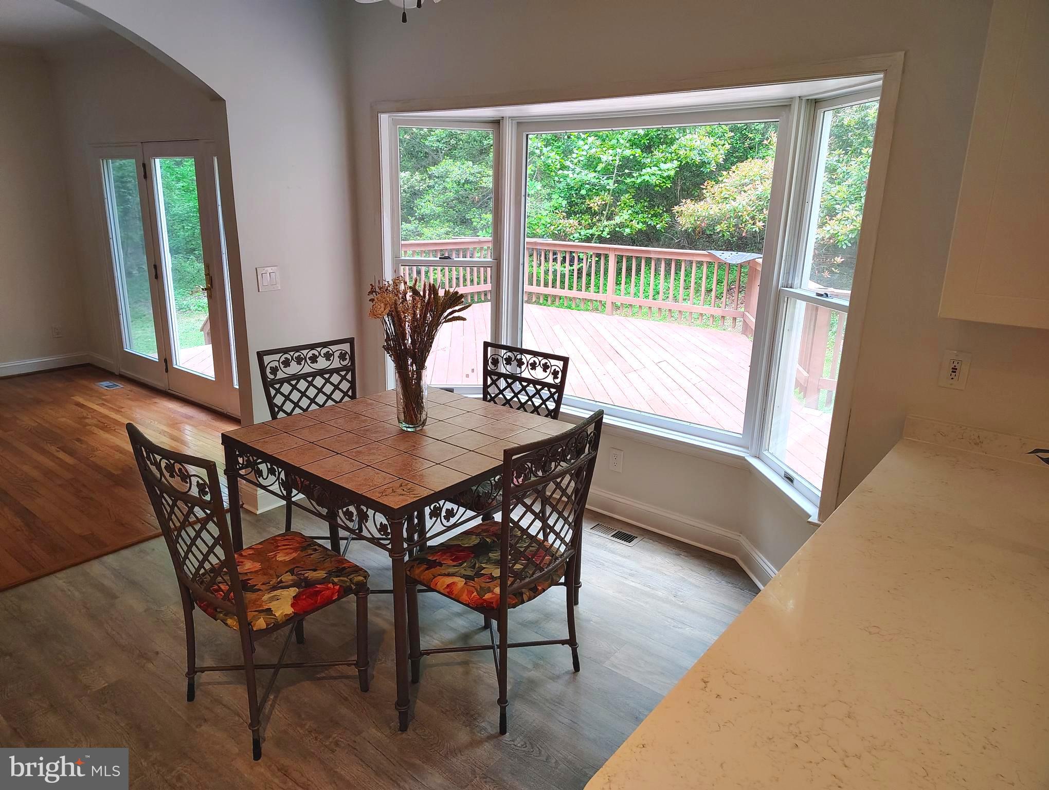1711 Ritchie Highway Annapolis, MD 21409 - Photo 9 of 16 a view of a dining room with furniture window and outside view