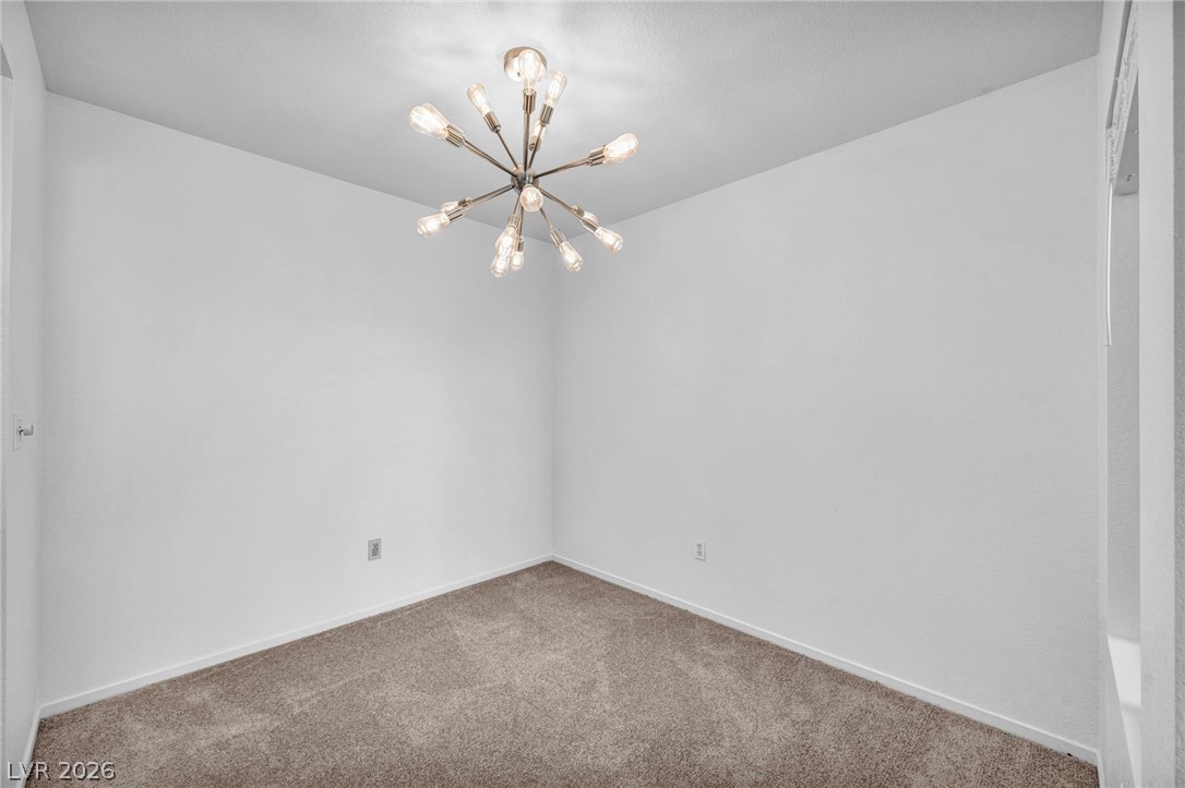 8070 West Russell Road, Unit 2060 Las Vegas, NV 89113 - Photo 23 of 47 This versatile room offers a blank canvas for your design aspirations, bathed in ample overhead light.