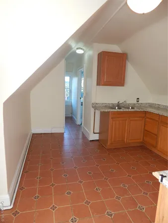 a view of a kitchen with a sink