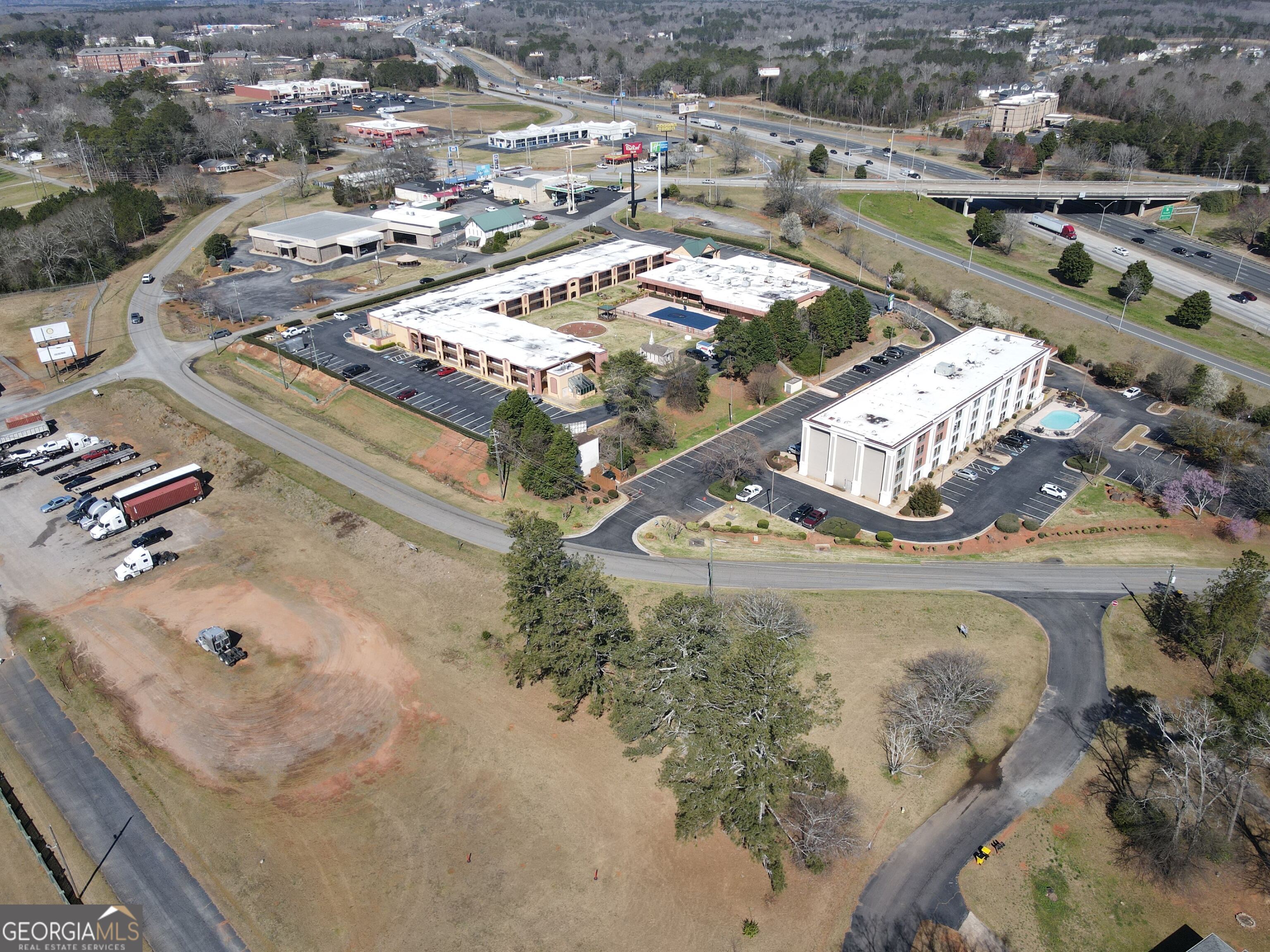0 Patrol Road Forsyth, GA 31029 - Photo 6 of 16 a picture of city view with houses