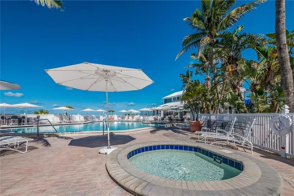 an outdoor view with swimming pool and outdoor seating