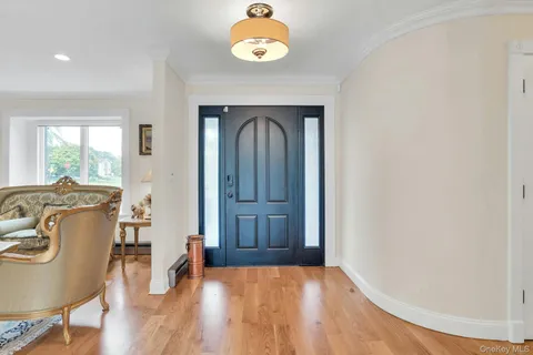 wooden floor in a room with a window