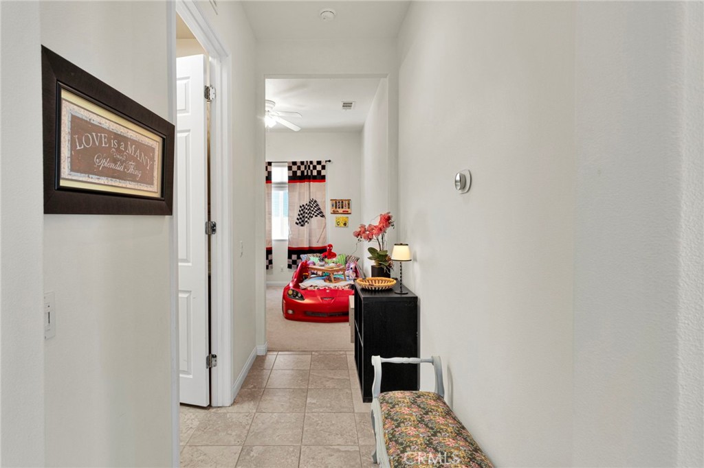 10676 Lanigan Road Apple Valley, CA 92308 - Photo 18 of 37 Hallway to Laundry Room & Office / Den Space
