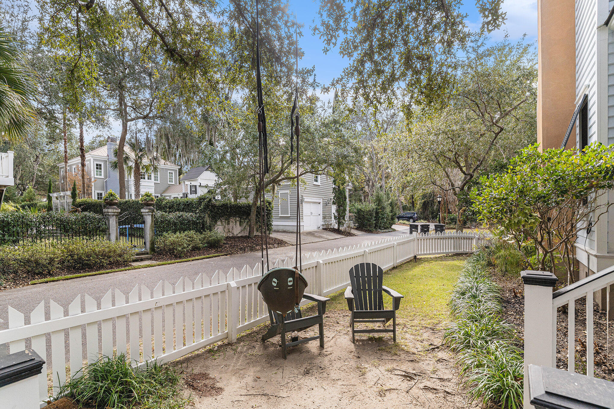 42 Isle Of Hope Road Mount Pleasant, SC 29464 - Photo 30 of 37 Fenced Yard with Swing and Seating