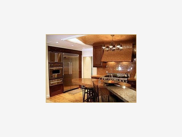 2920 Hillside Drive Burlingame, CA 94010 - Photo 2 of 9 a picture of a living room with a sink and chairs