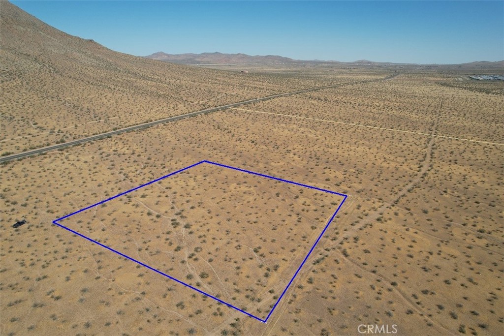 35 Gustine Street Apple Valley, CA 92307 - Photo 2 of 7 Looking North Apple Valley toward future Brightline West Terminal - Love's Travel Center & Lecangs Project - Existing Walmart/former Big Lots Distritbution Center -