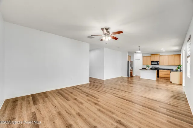 a view of kitchen with natural light