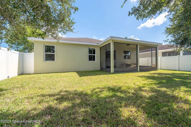 a view of swimming pool from a balcony