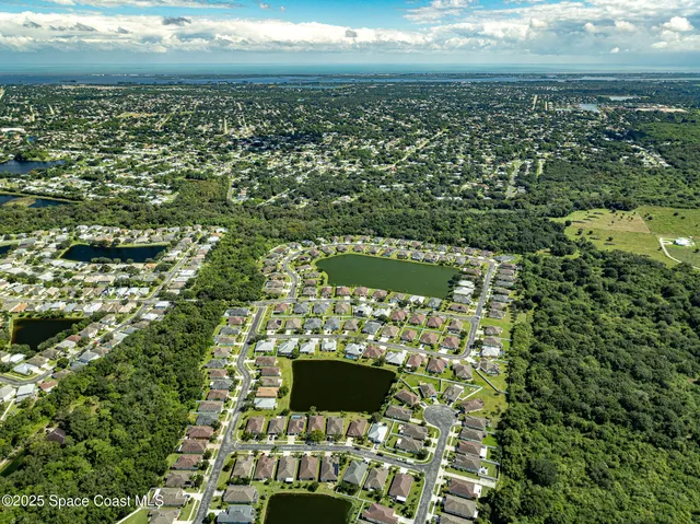 a view of a bench in front of house