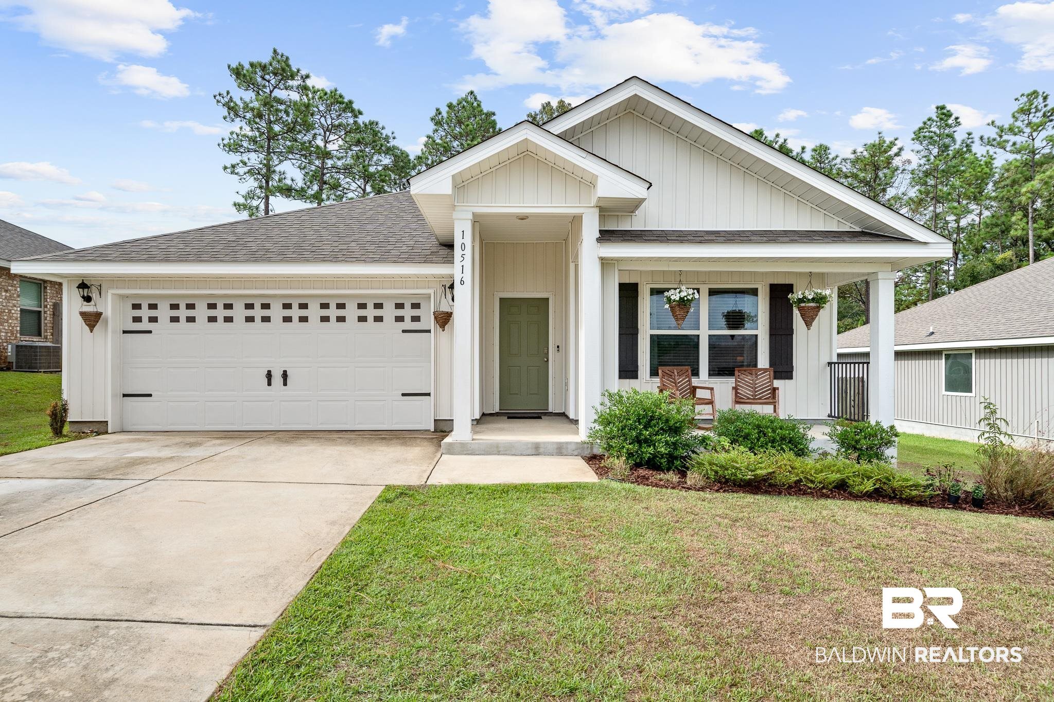 10516 Brodick Loop Daphne, AL 36527 - Photo 1 of 27 View of front of property with covered porch, central AC, and a front yard