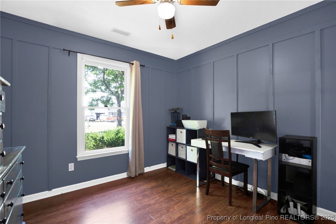 156 Barefoot Road Fayetteville, NC 28306 - Photo 19 of 28 a view of a workspace with furniture and a window