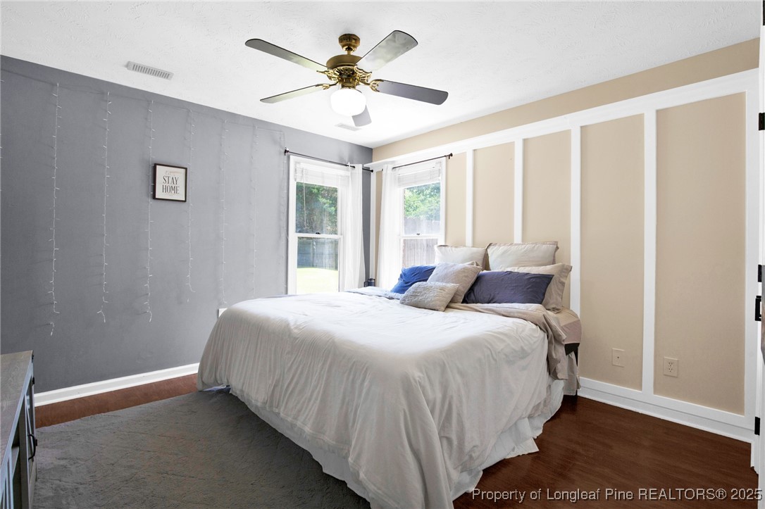 156 Barefoot Road Fayetteville, NC 28306 - Photo 20 of 28 a bedroom with a large bed and a window