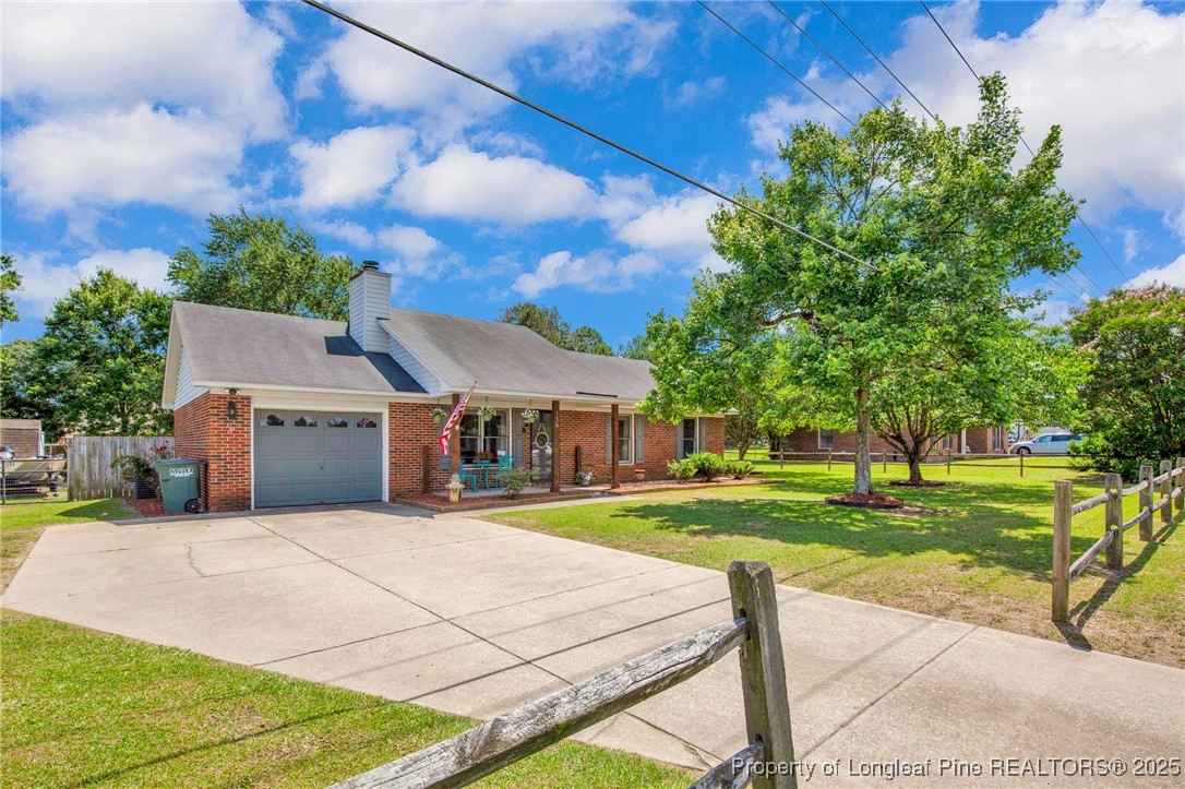 156 Barefoot Road Fayetteville, NC 28306 - Photo 2 of 28 a front view of a house with a yard