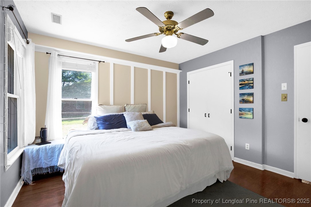 156 Barefoot Road Fayetteville, NC 28306 - Photo 21 of 28 a bedroom with a large bed and a window