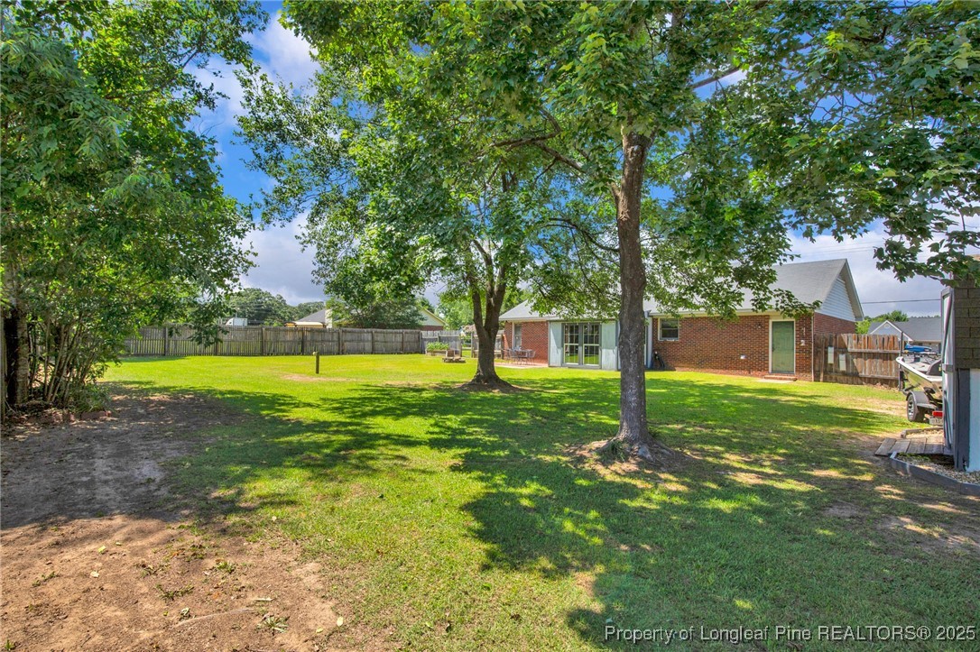 156 Barefoot Road Fayetteville, NC 28306 - Photo 27 of 28 a view of a house with a big yard