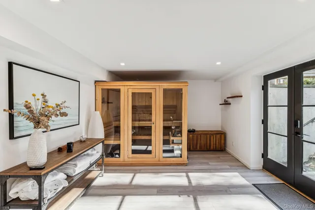 a living room with furniture and a window