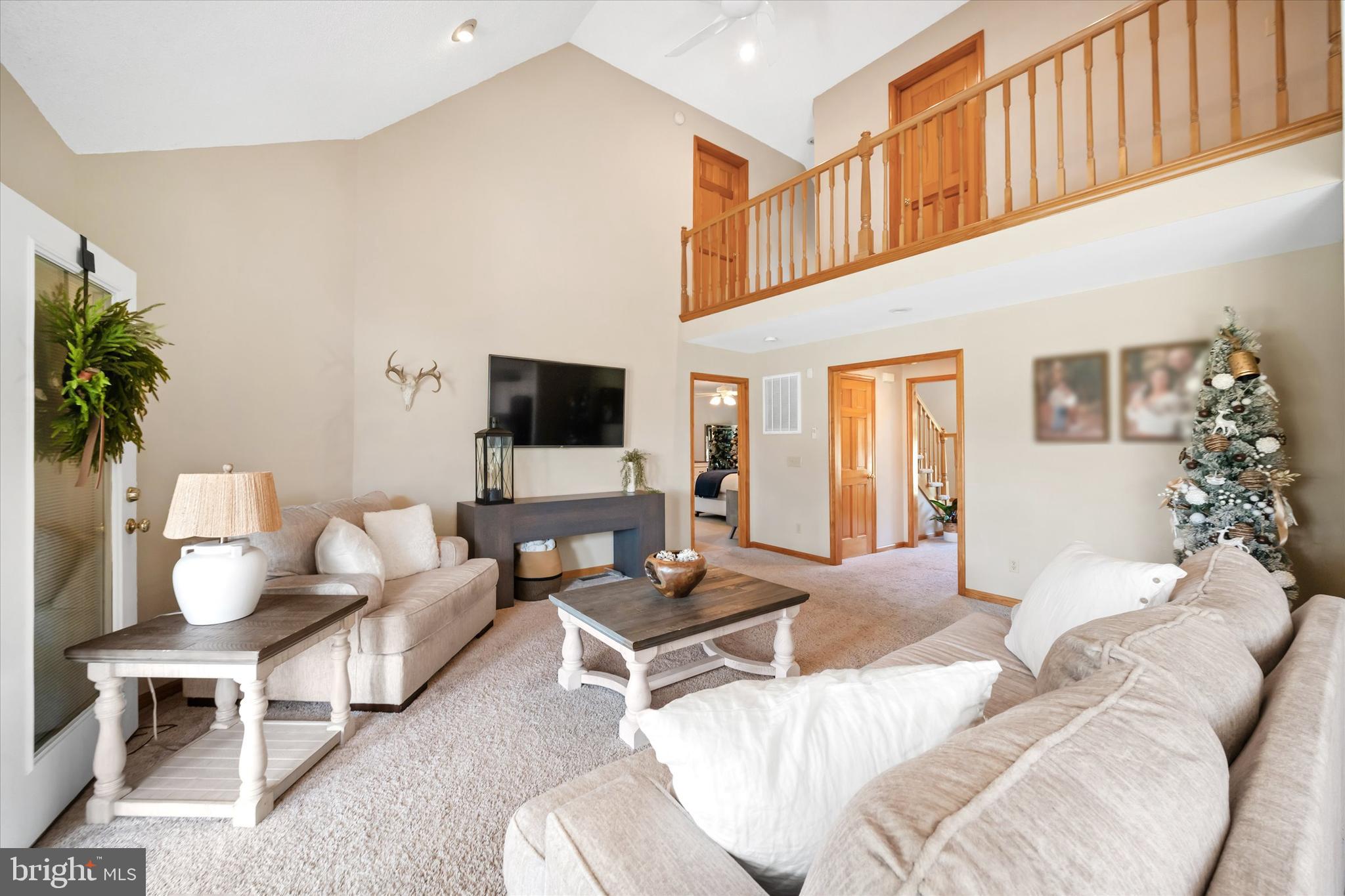 1265 Bowman Road Milford, DE 19963 - Photo 11 of 60 a living room with furniture and a flat screen tv