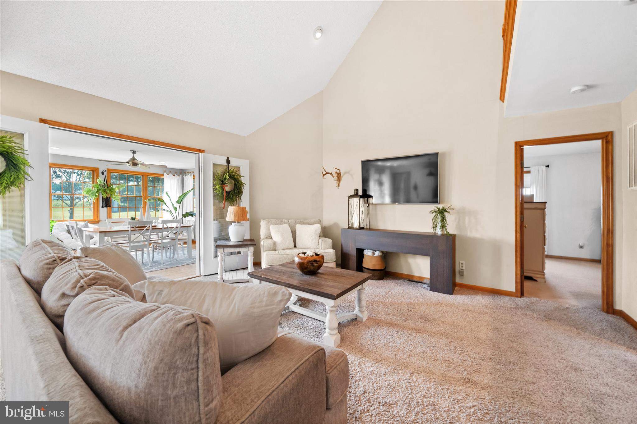 1265 Bowman Road Milford, DE 19963 - Photo 13 of 60 a living room with furniture and a large window