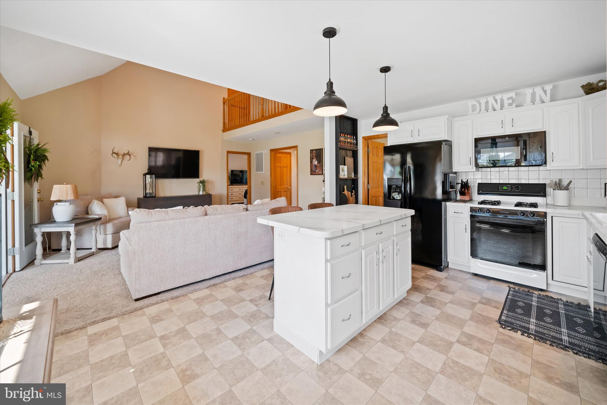 1265 Bowman Road Milford, DE 19963 - Photo 14 of 60 a kitchen with a sink stove and microwave