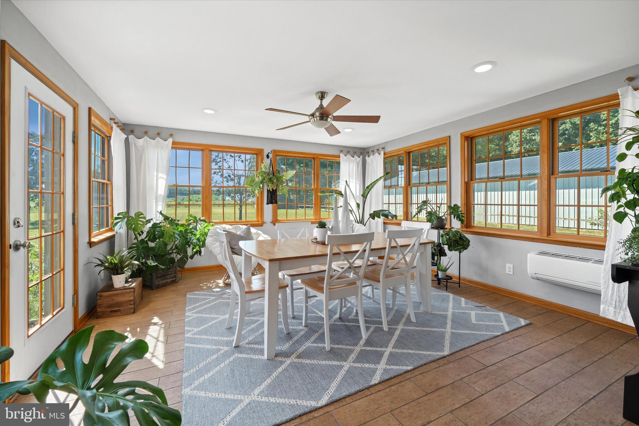 1265 Bowman Road Milford, DE 19963 - Photo 21 of 60 a view of a dining room with furniture window and outside view