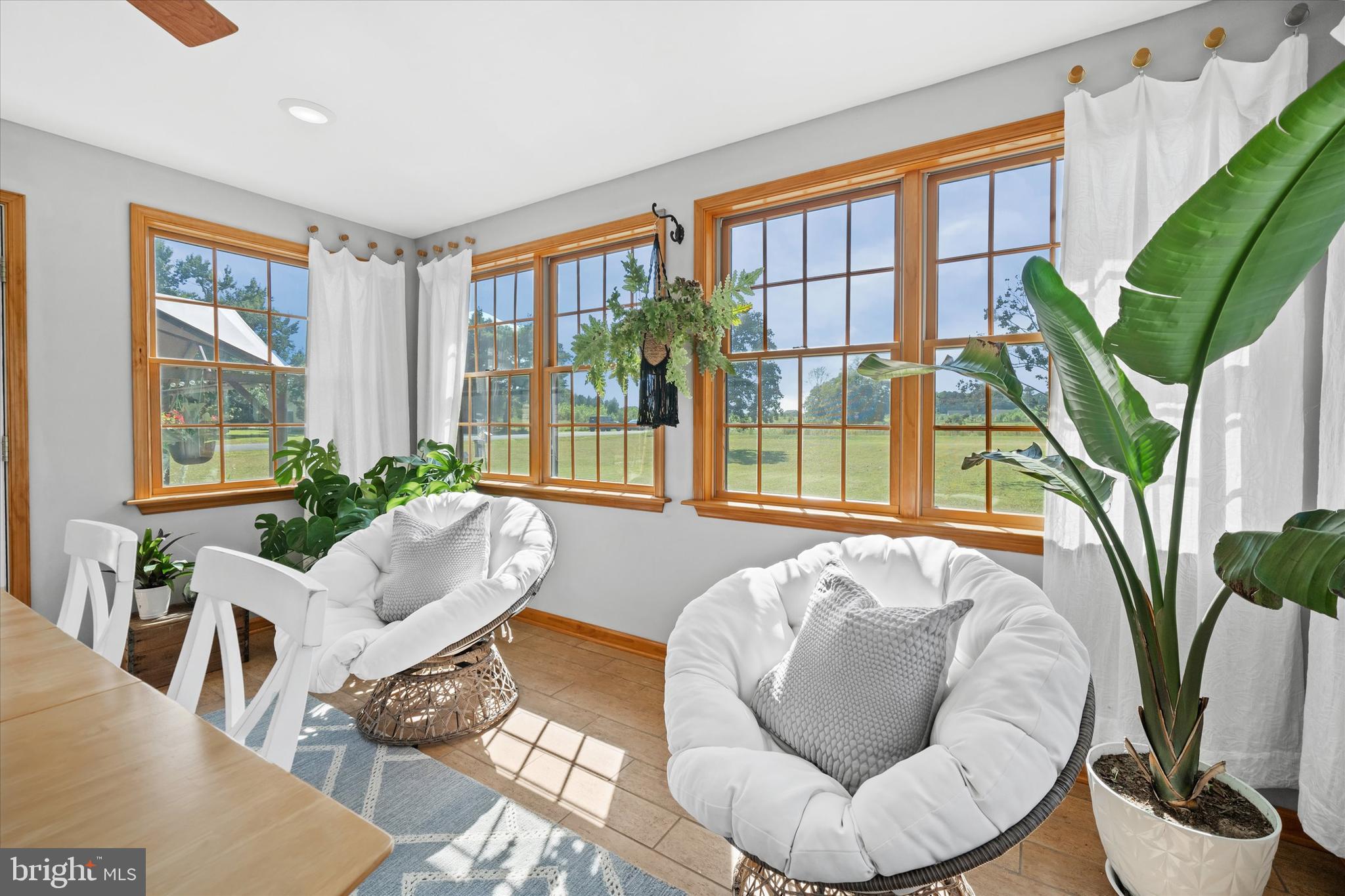 1265 Bowman Road Milford, DE 19963 - Photo 23 of 60 a living room with furniture and a large window