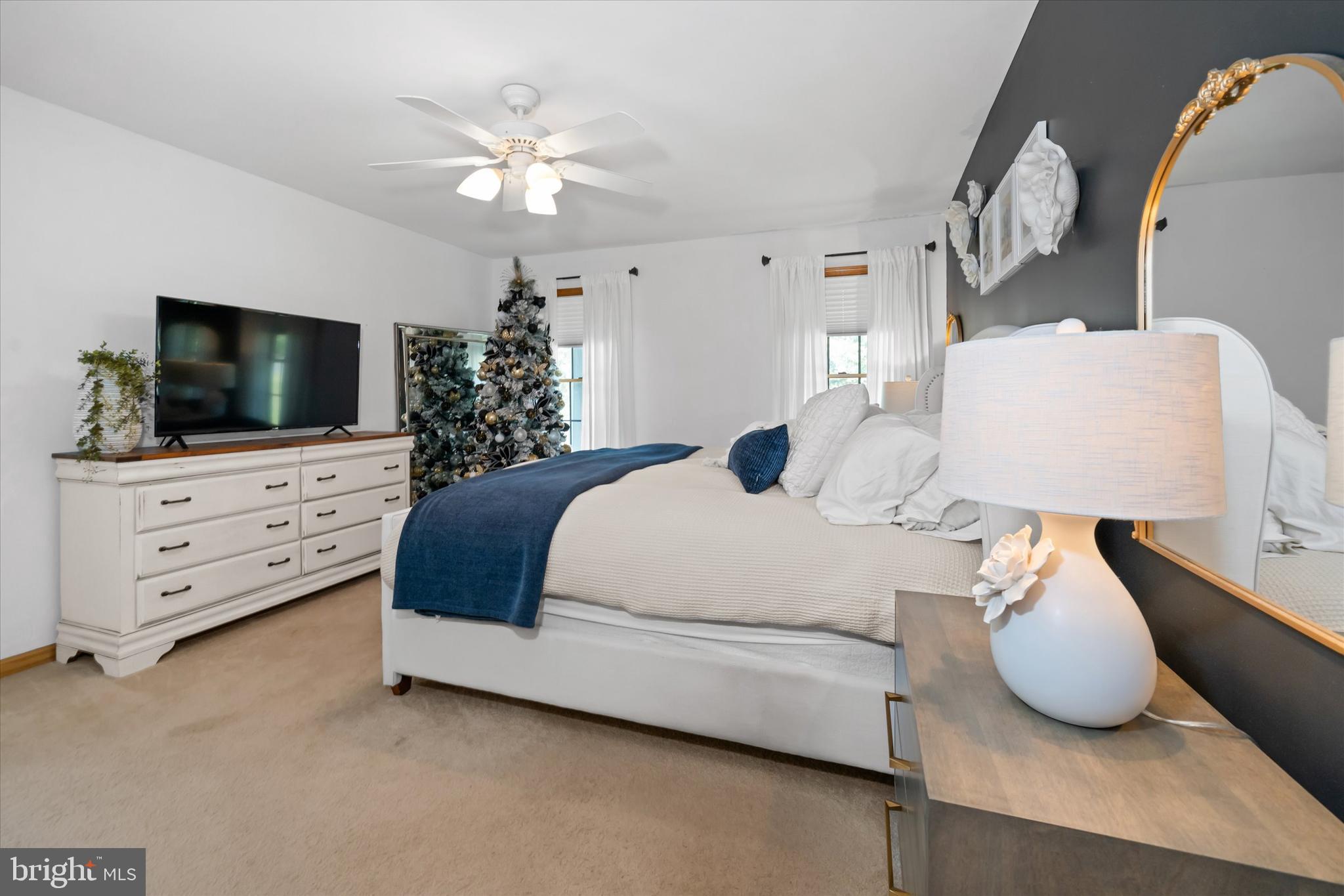 1265 Bowman Road Milford, DE 19963 - Photo 26 of 60 a bedroom with a bed and a flat screen tv