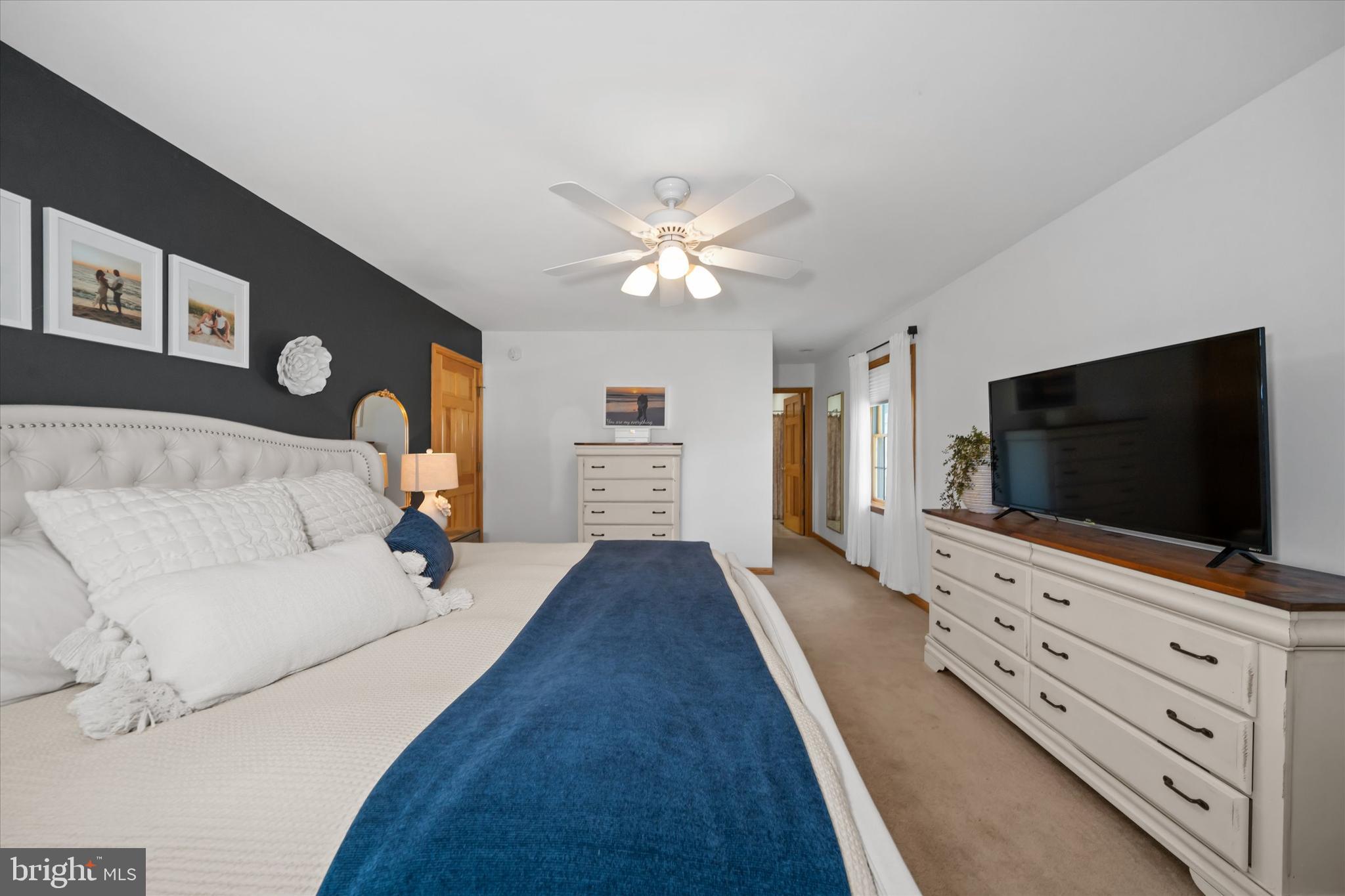 1265 Bowman Road Milford, DE 19963 - Photo 27 of 60 a living room with furniture and a flat screen tv
