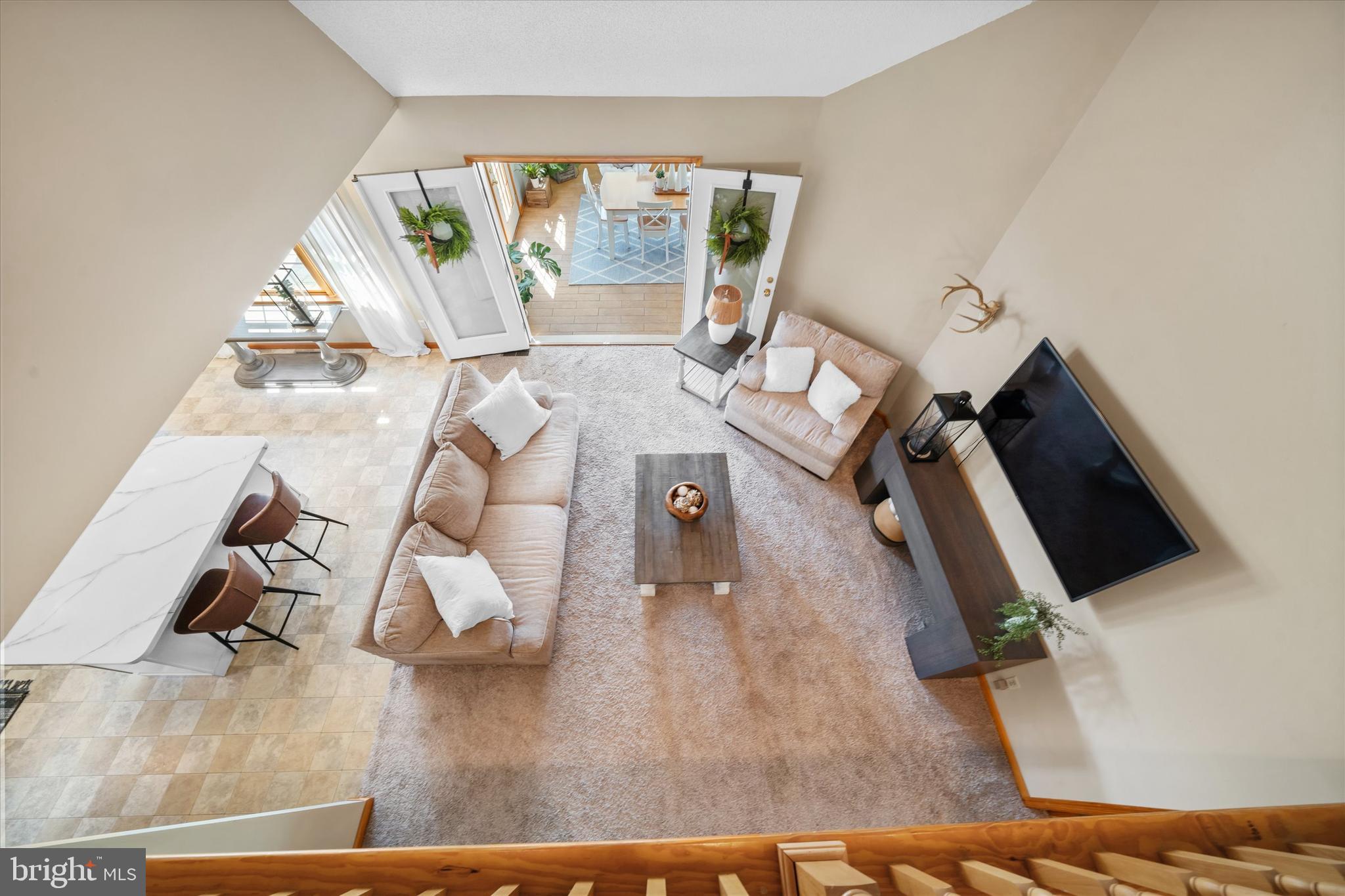 1265 Bowman Road Milford, DE 19963 - Photo 37 of 60 a living room with furniture and a flat screen tv