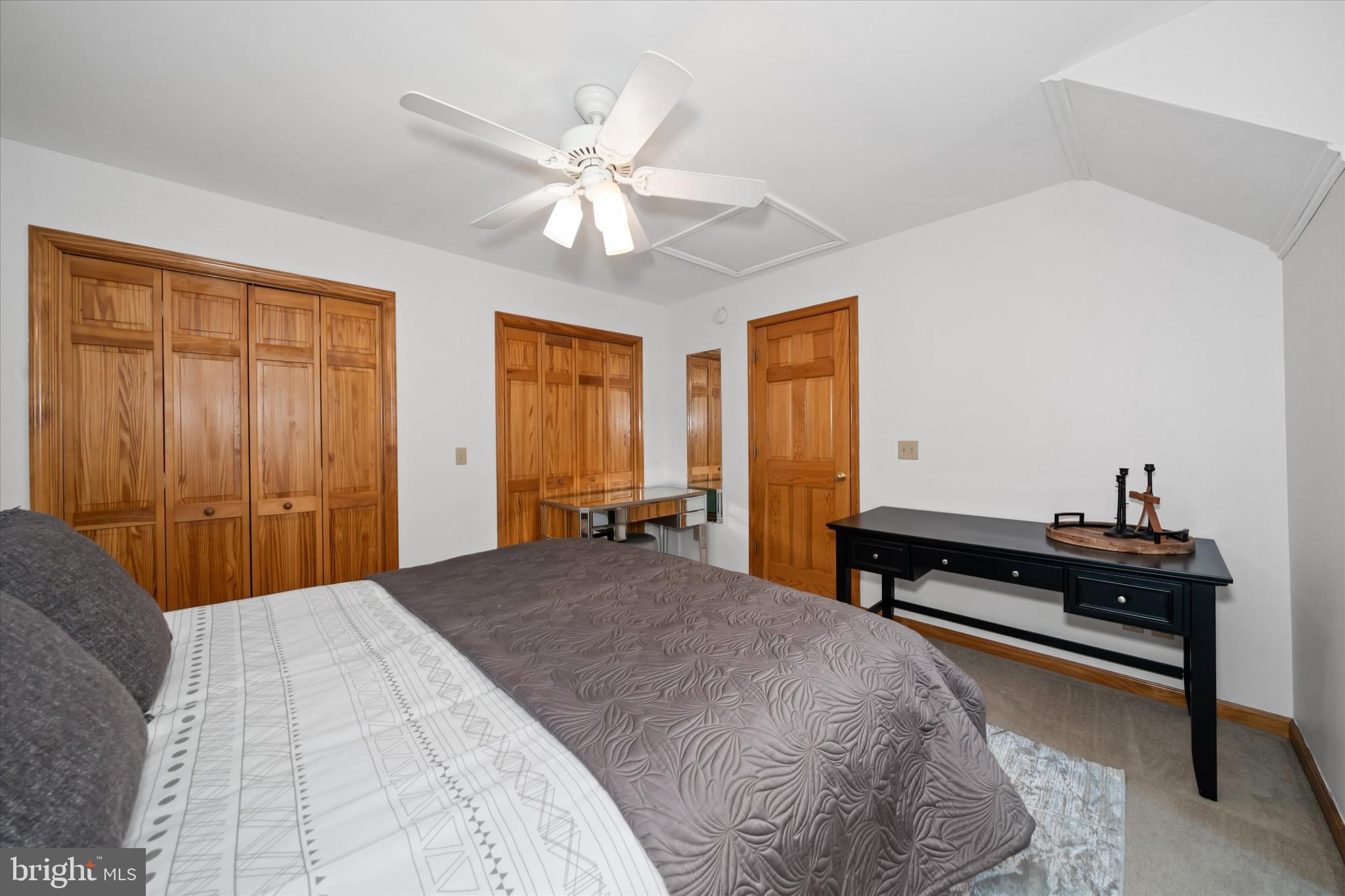 1265 Bowman Road Milford, DE 19963 - Photo 40 of 60 a bedroom with a bed and a chandelier