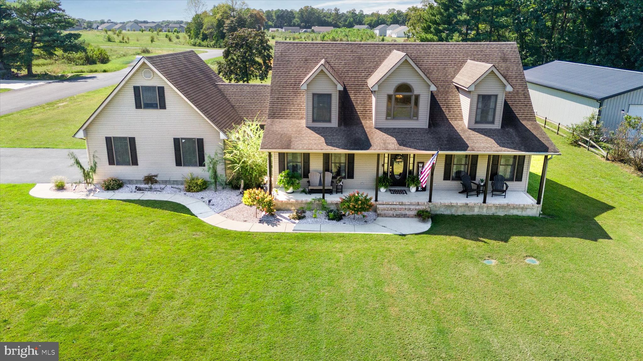1265 Bowman Road Milford, DE 19963 - Photo 46 of 60 a front view of house with yard and green space