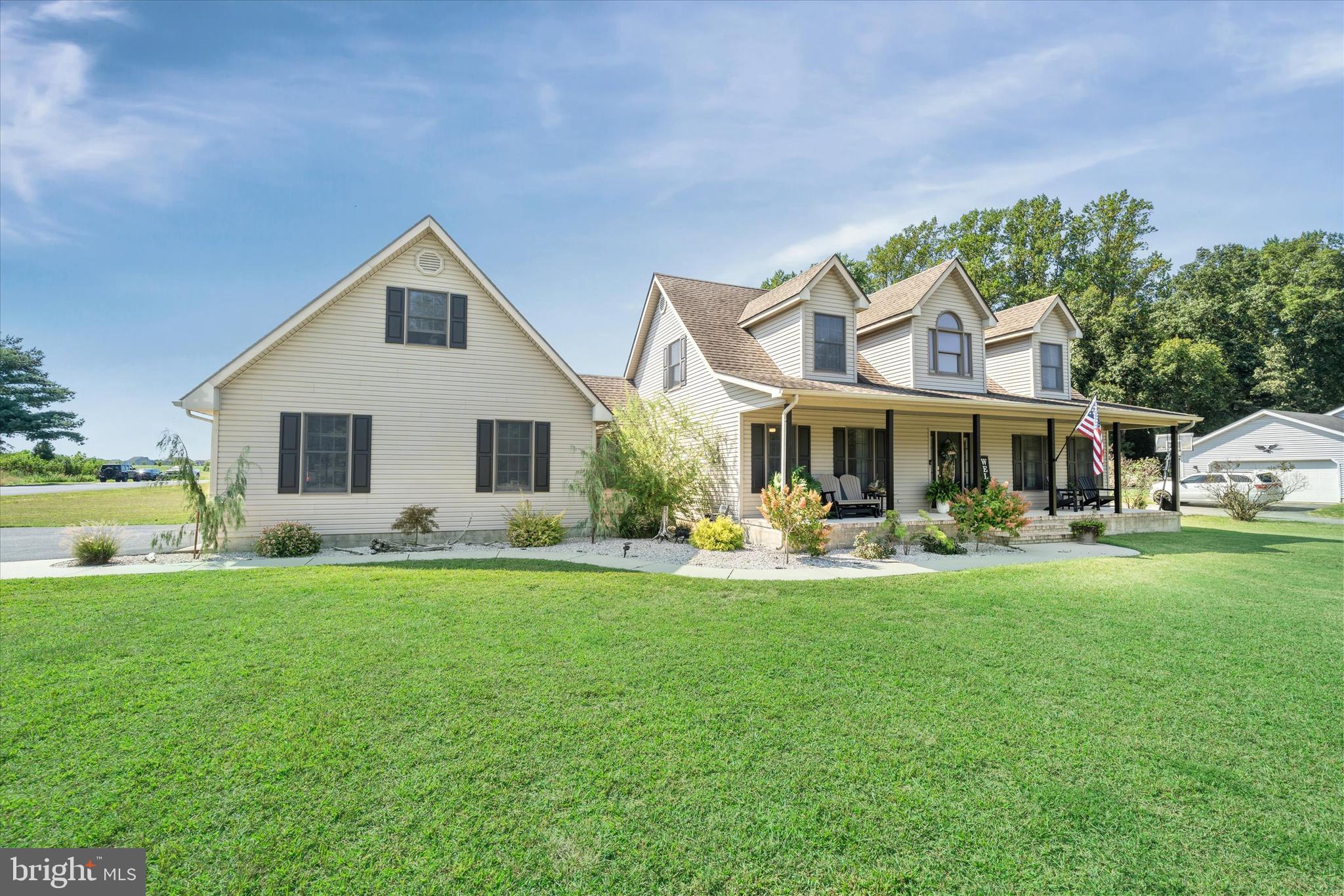 1265 Bowman Road Milford, DE 19963 - Photo 47 of 60 a view of a house with a yard and sitting area
