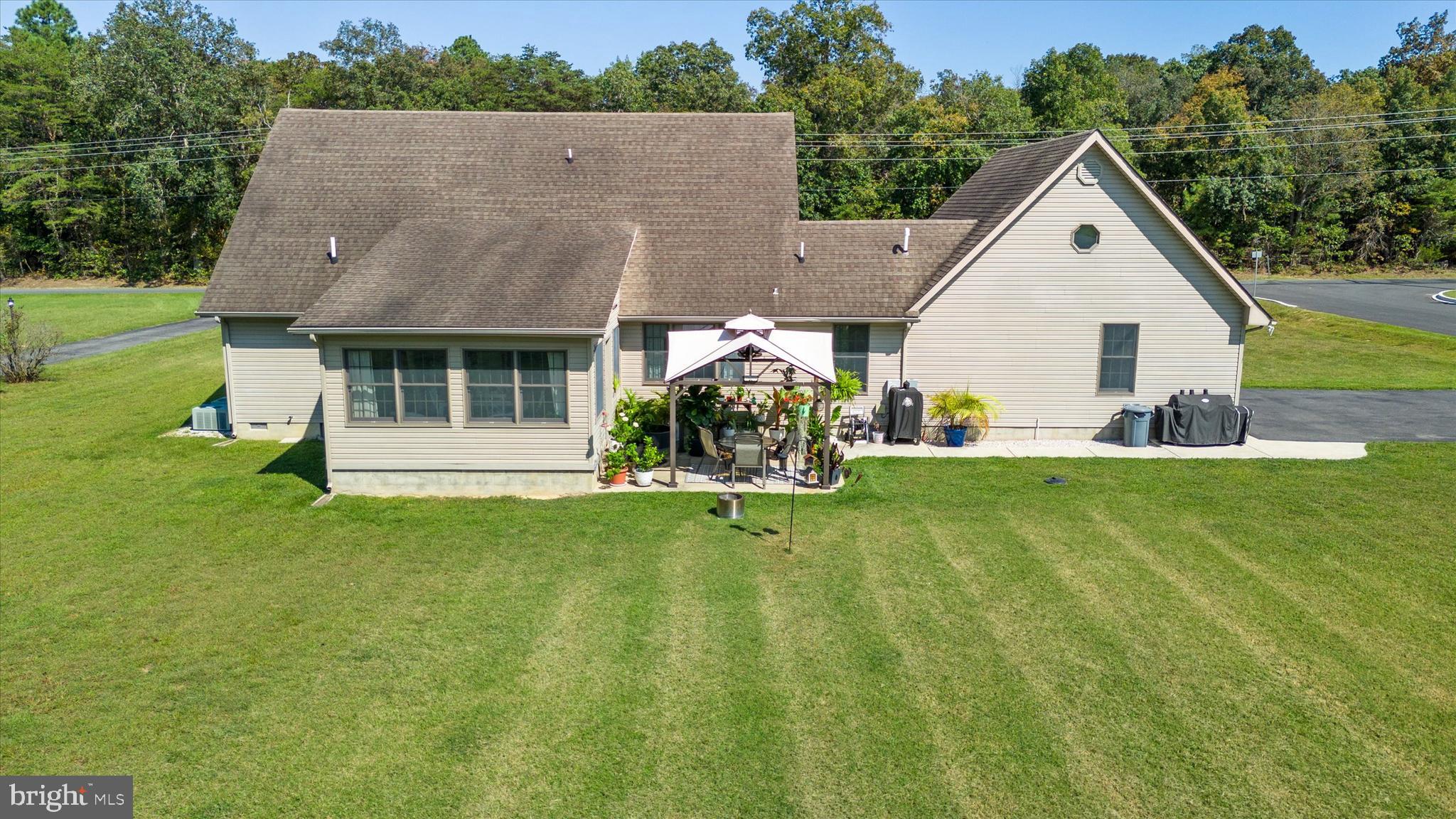 1265 Bowman Road Milford, DE 19963 - Photo 49 of 60 a front view of house with yard and green space