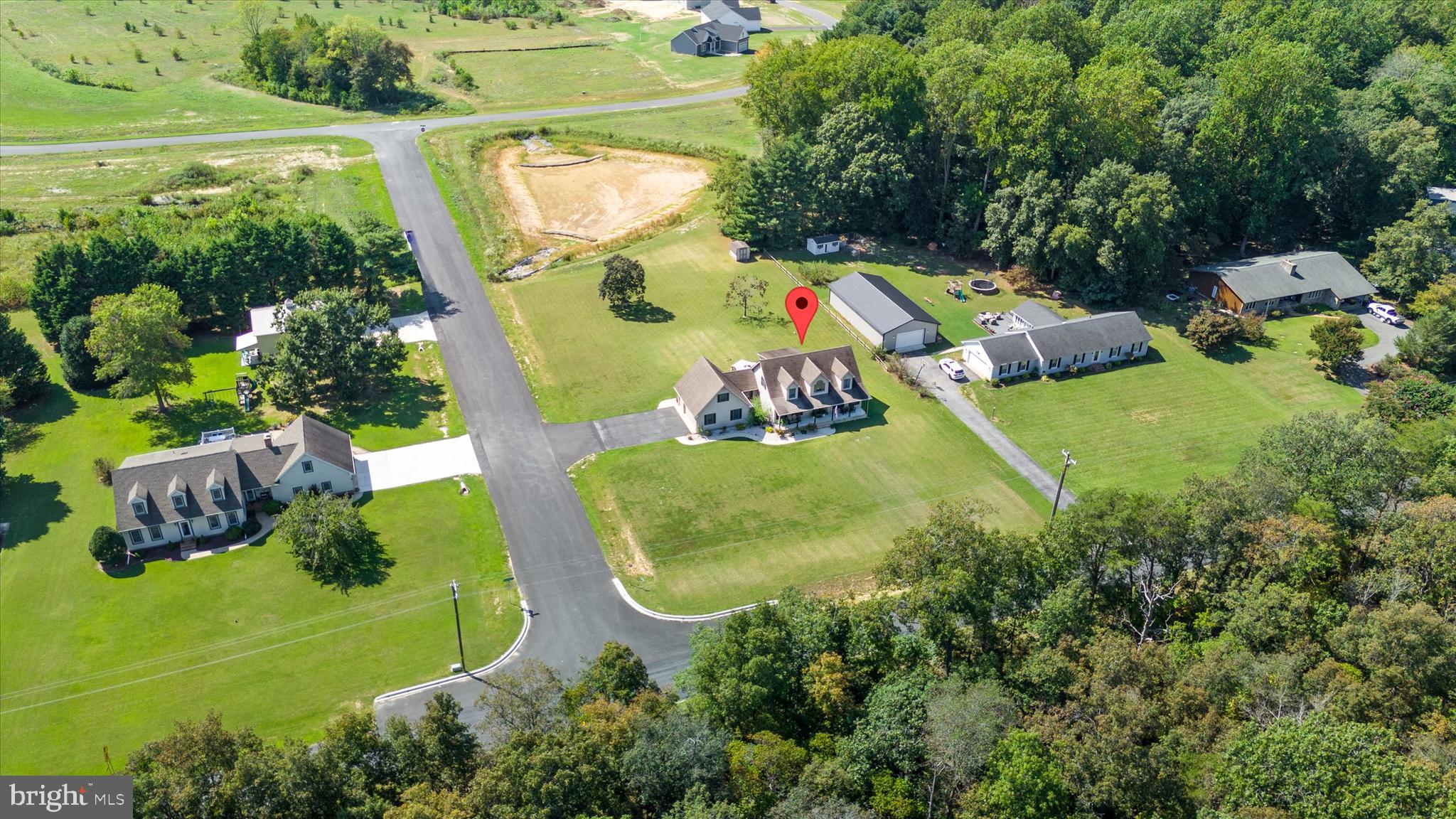 1265 Bowman Road Milford, DE 19963 - Photo 57 of 60 an aerial view of a swimming pool